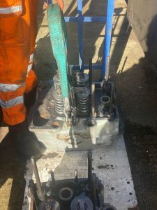The replacement cylinder head connected up for craning into the loco. Photo by Georgia Williams