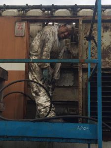 Who said steam cleaning was a clean persons job, James Whincup wearing most of the dirt while steam cleaning D5830. Photo by Peter Harrison