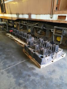 D5830 cylinder heads on pallets, waiting for further steam cleaning before going away for overhual. Photo by James Whincup