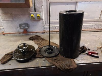 The oil filter frame on the left and the old oil filter on the right. Photo by James Whincup