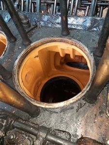 View into the engine block where the cylinder liner lives. Photo by James Whincup