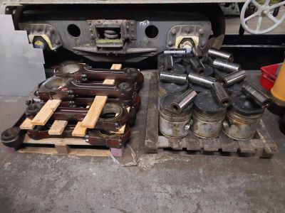 On the left are the conrods and on the right are the pistons with their gudgeon pins on top. Photo by James Whincup