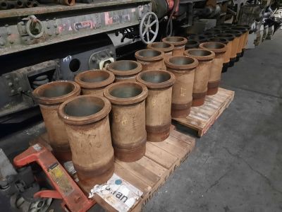 The new cylinder liners closest to us on pallets and the old ones behind. Photo by James Whincup