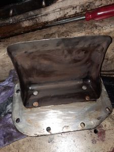 Cam cover and tray being cleaned. Photo by James Whincup