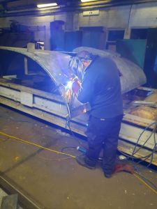 New of steel piece being welded into the boiler roof. Photo by James Whincup