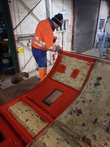 The roof section that goes over the turbos being painted. Photo by James Whincup