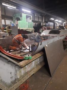 The roof section over the power unit being prepped for painting. Photo by Libby Whincup