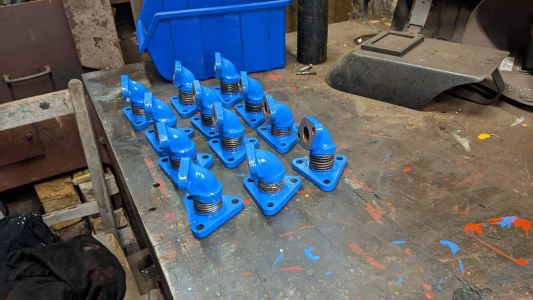 Coolant block-to-head elbows in gloss top coat. Photo by Steve Rowston