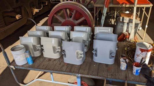 The fuel pump covers being painted into gloss. Photo by James Whincup