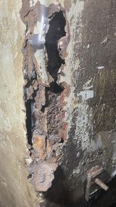 Rot on the corner of the radiator tunnel. Photo by Georgia Williams