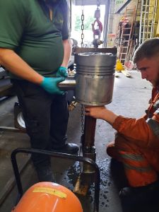 The gudgeon pin is fitted into the piston to hold the conrod. Photo by James Whincup