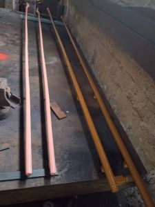 Oil and fuel pipes that run along the engine being repainted. Photo by Steve Rowston