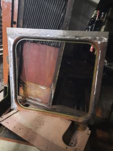 The boiler room window with new steel welded on. Photo by James Whincup