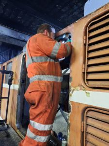 Steve drilling one of the studs that wouldn't wind out. Photo by James Whincup