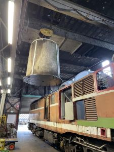 The concrete block being craned back into the loco. Photo by Paul Seaman