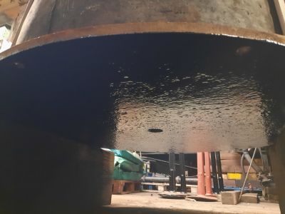 Boiler room concrete block underneath after needle gunning and painting. Photo by James Whincup