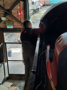 After the cant rail has been stripped it is being painted. Photo by James Whincup