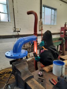 One of the coolant pipes being painted. Photo by James Whincup