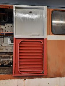A side engine room door has been needle gunned and painted. Photo by James Whincup