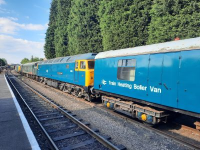 D1705 in the sun at Loughborough coupled to the steam heat van. Photo by James Whincup
