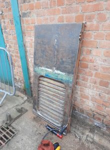 One of the engine room doors outside for needle gunning. Photo by James Whincup